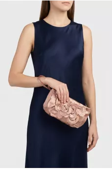 Textile clutch with a flower