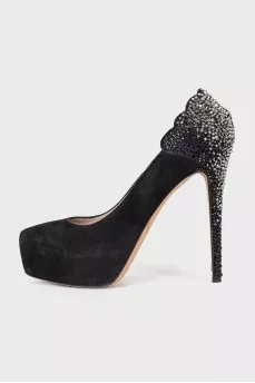 Black suede shoes decorated with rhinestones