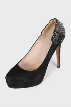 Black suede shoes decorated with rhinestones