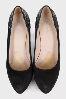 Black suede shoes decorated with rhinestones
