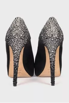 Black suede shoes decorated with rhinestones