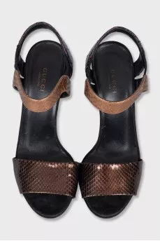 Textured leather sandals with a shaped heel