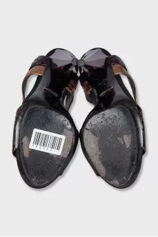 Textured leather sandals with a shaped heel