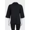 Black T-shirt with ties at the collar