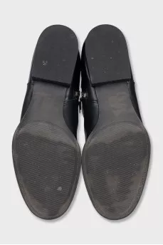 Leather boots with silver pendant