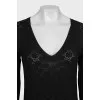 Black pullover with signature monogram