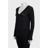 Black pullover with signature monogram