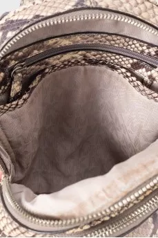 Leather backpack with animal print