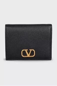 Black leather wallet with gold logo