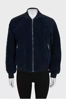 Blue bomber jacket with a zipper