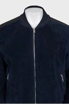 Blue bomber jacket with a zipper