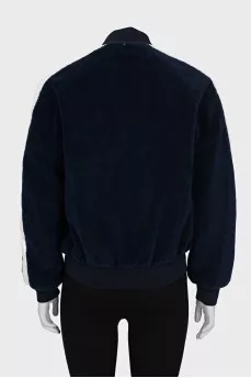 Blue bomber jacket with a zipper