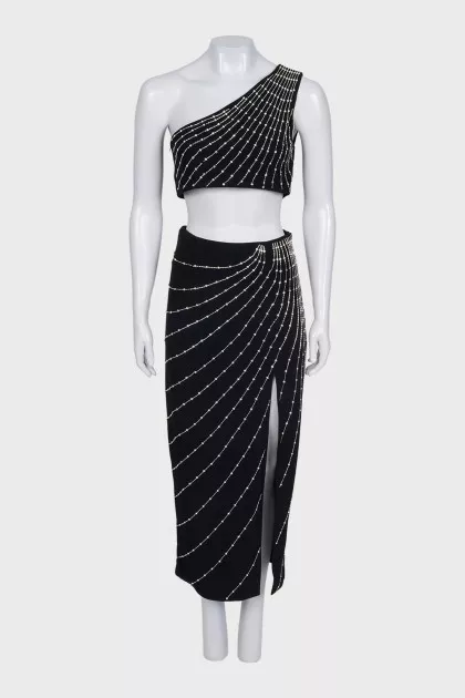 A skirt and top suit decorated with crystals