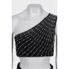 A skirt and top suit decorated with crystals