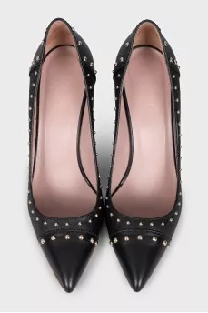 Leather pumps with gold decor