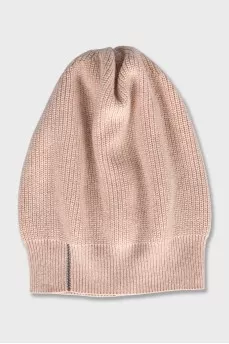 Beige knitted hat with decoration