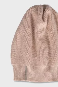 Beige knitted hat with decoration