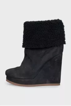 Wedge boots with fur uppers