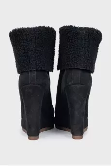 Wedge boots with fur uppers