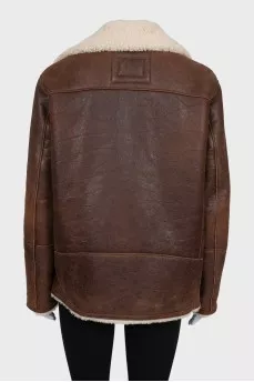 Brown sheepskin coat with a beveled zipper