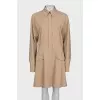 Beige fitted dress with buttons