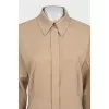 Beige fitted dress with buttons