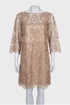 A straight-cut dress decorated with sequins