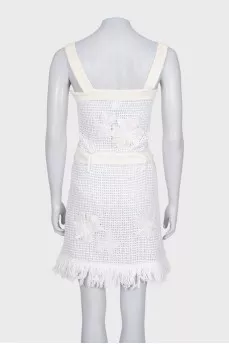 Knitted white sundress with fringe