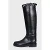 Black leather boots with straps