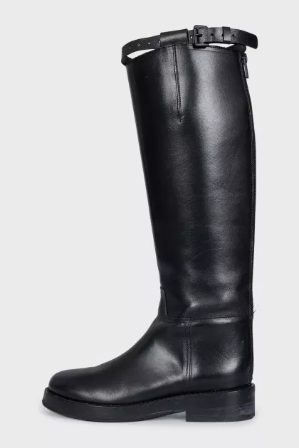 Black leather boots with straps