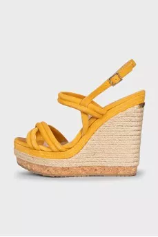 Suede sandals with a woven wedge heel