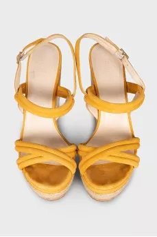 Suede sandals with a woven wedge heel