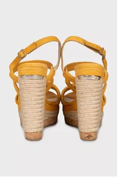 Suede sandals with a woven wedge heel