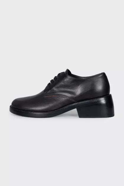 Black leather brogues