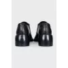 Black leather brogues