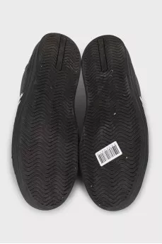Men's black sneakers with a signature logo
