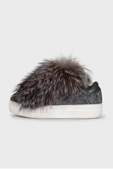 Textile sneakers decorated with fur