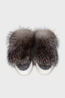 Textile sneakers decorated with fur