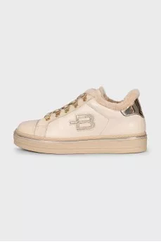 Insulated leather boots with gold-tone hardware