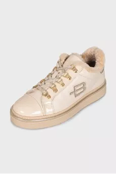 Insulated leather boots with gold-tone hardware