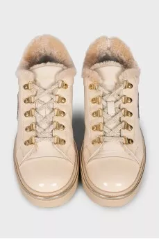 Insulated leather boots with gold-tone hardware
