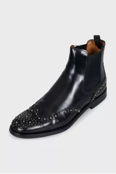 Black leather boots with metallic decor