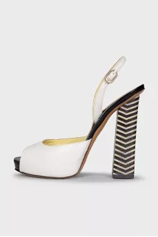 White sandals with striped heels