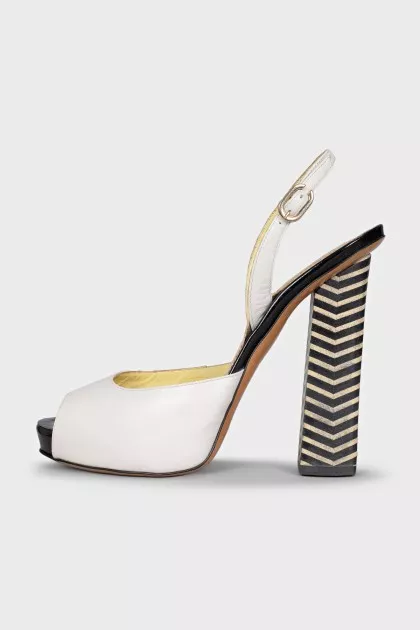 White sandals with striped heels