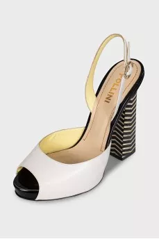 White sandals with striped heels