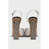 White sandals with striped heels