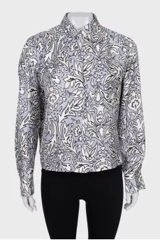 Loose-fitting silk shirt with a print