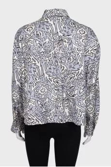 Loose-fitting silk shirt with a print
