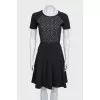 Fitted black dress with short sleeves