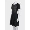 Fitted black dress with short sleeves